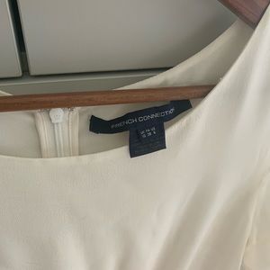 Cream coloured French Connection dress.